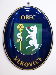 Emailliertes Oval mit dem Wappen und Namen der Gemeinde/ Stadt/ des Marktfleckens